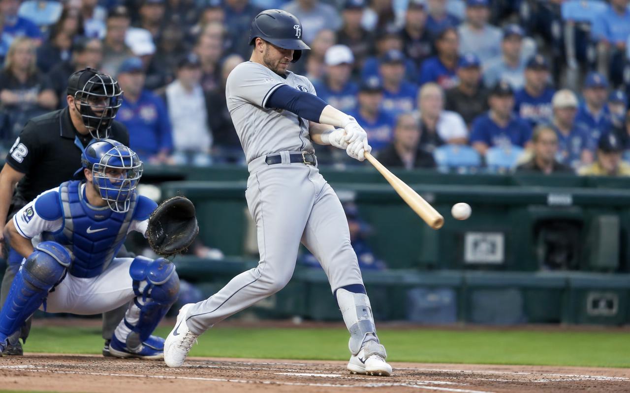 Baseball batter swinging at the plate